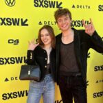 Sadie Soverall Instagram - Arcadian premiere at @sxsw ! Wow what an incredible few days- I’m so grateful to everyone who made it possible for me to be there to support this wonderful film! Austin is the most beautiful city I’m definitely coming back ( ps, as a huge impractical jokers fan this was the cherry on top of a phenomenal weekend ) Find Arcadian in theatres from April 12th ! 🪳🏌️🌌 Thank you ! @personalpruk @ruby.phet @nataliesdays @celine @annahcstyle HMU ❤️ @ariel_beautyco @sophiaartistry