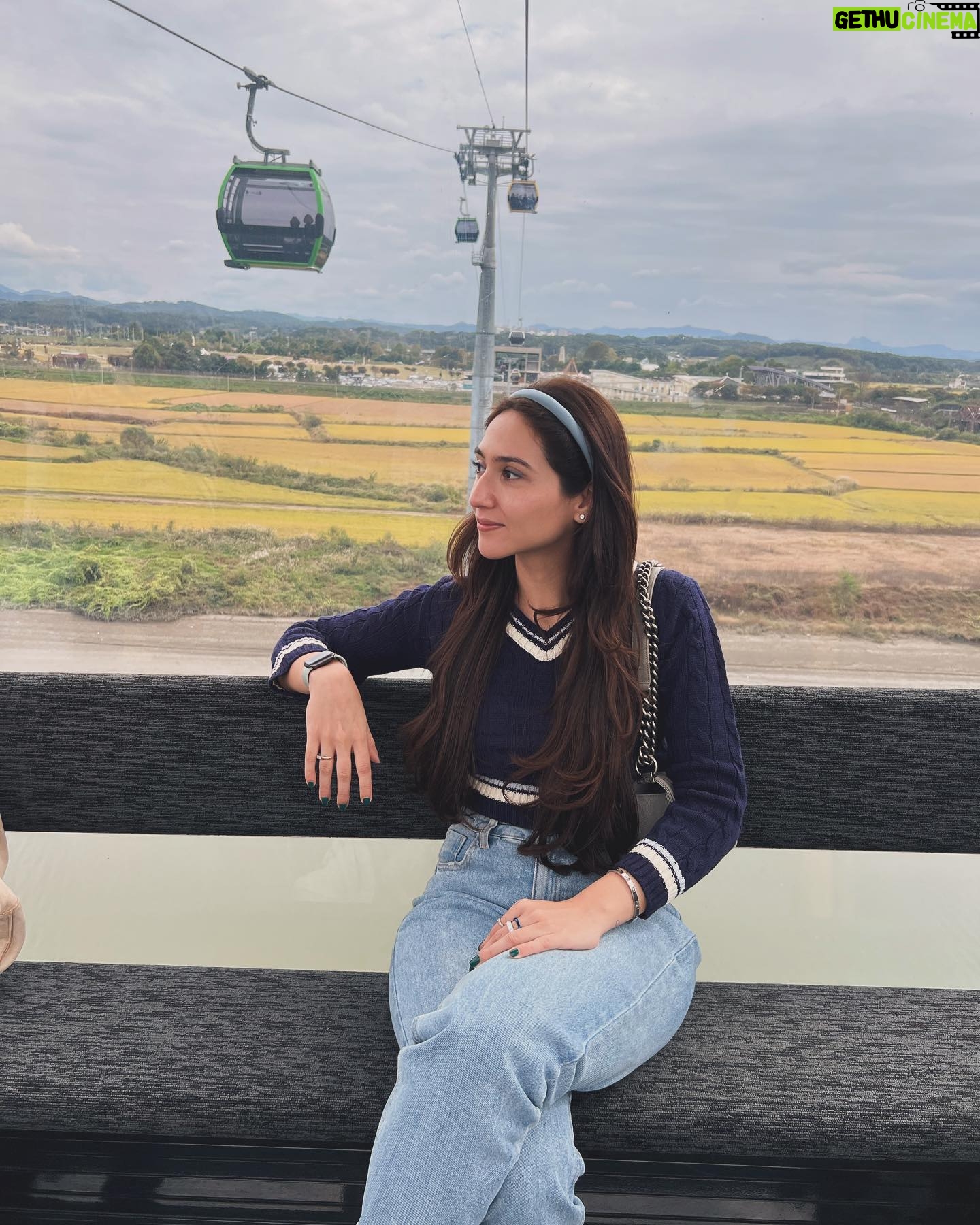 Sahiba Bali Instagram - Crash landed on you 🇰🇵 Dint get a chance to upload this before but Oct’23 we went to the demilitarised zone of North Korea with South. the land that Ive read about, the nation I’ve seen in documentaries, the unknown territory suddenly was in front of me. I cant explain the goosebumps I had when I saw a few locals through a telescope riding a bike deep within the city, the chills I got when I witnessed #DPRK - cant describe the feeling of being in the most shielded country in the world and yet being so far. How can our worlds be so different? #NorthKorea #DMZ