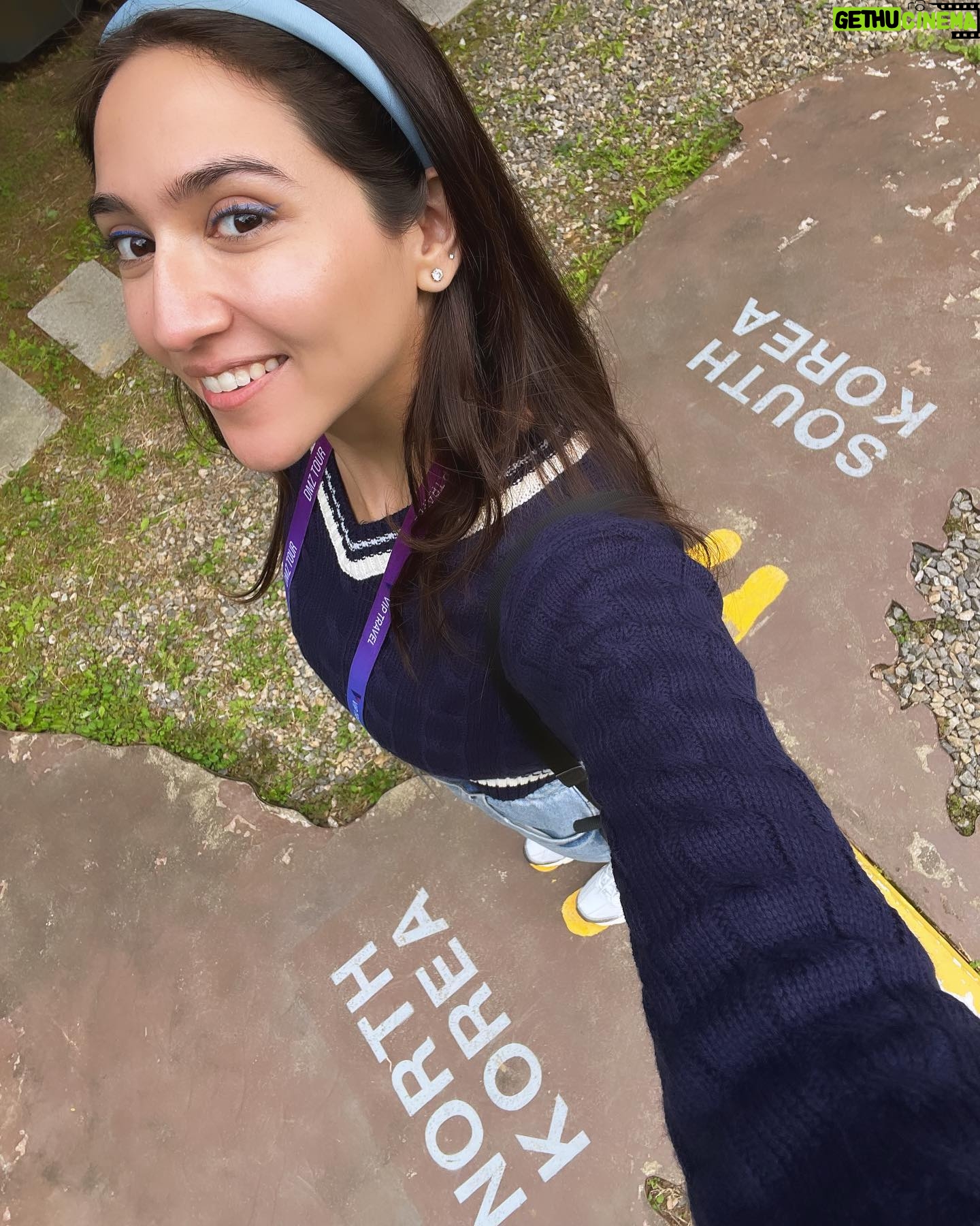Sahiba Bali Instagram - Crash landed on you 🇰🇵 Dint get a chance to upload this before but Oct’23 we went to the demilitarised zone of North Korea with South. the land that Ive read about, the nation I’ve seen in documentaries, the unknown territory suddenly was in front of me. I cant explain the goosebumps I had when I saw a few locals through a telescope riding a bike deep within the city, the chills I got when I witnessed #DPRK - cant describe the feeling of being in the most shielded country in the world and yet being so far. How can our worlds be so different? #NorthKorea #DMZ