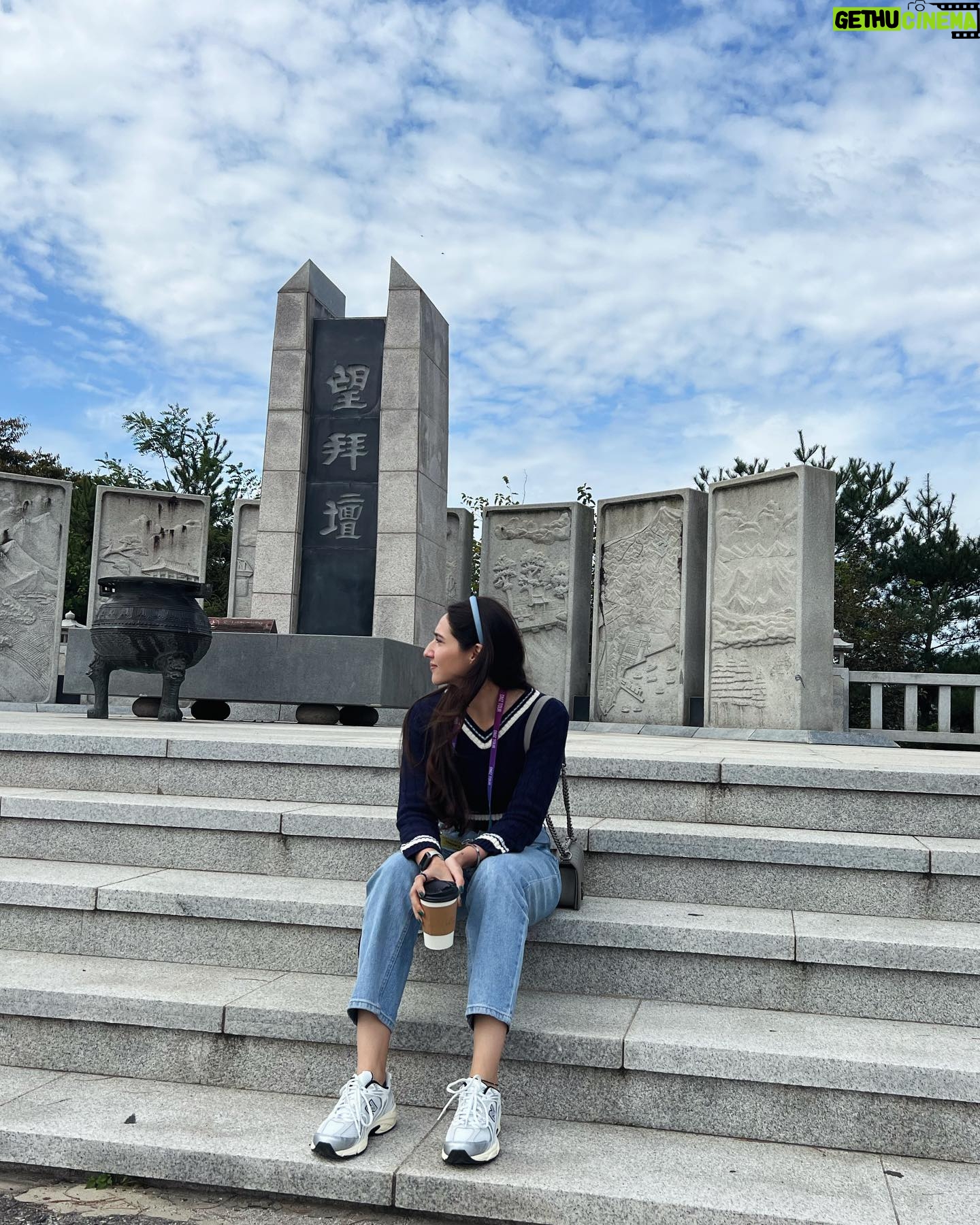 Sahiba Bali Instagram - Crash landed on you 🇰🇵 Dint get a chance to upload this before but Oct’23 we went to the demilitarised zone of North Korea with South. the land that Ive read about, the nation I’ve seen in documentaries, the unknown territory suddenly was in front of me. I cant explain the goosebumps I had when I saw a few locals through a telescope riding a bike deep within the city, the chills I got when I witnessed #DPRK - cant describe the feeling of being in the most shielded country in the world and yet being so far. How can our worlds be so different? #NorthKorea #DMZ