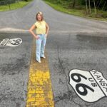 Samantha Brown Instagram - Back on the Mother Road! Shooting two episodes beginning in St Louis, Missouri traveling to Santa Fe, New Mexico. @gearhead_curios With Aaron Perry the owner of the 1939 filling station. In Galena, Kansas The Yellow brick road. 😉 Boots Motel built in 1939 one of the few original hotels of that era on Route 66 still open. Carthage, MO Ted Drewes famous Frozen custard “concrete” shakes. St. Louis, MO Devils Elbow Bridge in Devils Elbow, Missouri The Osage Trail Monument. Cuba, Missouri