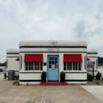 Samantha Brown Instagram - Back on the Mother Road! Shooting two episodes beginning in St Louis, Missouri traveling to Santa Fe, New Mexico. @gearhead_curios With Aaron Perry the owner of the 1939 filling station. In Galena, Kansas The Yellow brick road. 😉 Boots Motel built in 1939 one of the few original hotels of that era on Route 66 still open. Carthage, MO Ted Drewes famous Frozen custard “concrete” shakes. St. Louis, MO Devils Elbow Bridge in Devils Elbow, Missouri The Osage Trail Monument. Cuba, Missouri