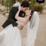 Samantha Hanratty Instagram - The day of her dreams ✨ Yellowjackets star Samantha Hanratty is MARRIED! Samantha and *now husband* Christian DeAnda went on a hike on their first date, Samantha says in that moment she knew they were "in it for the long haul". Now they are taking their first steps as husband and wife, just three years later. 🤍 Head to the link in bio to get the exclusive first look at photos and details from the couples' stunning day. 🙌 Ceremony and Reception Venue: @terramiapr Photographer: @michellerollerphoto Videographer: @loveinfocusfilms Coordinator: @blushandtwinedesigns Event Designer: Ellen Hanratty Florist: Diane Lannon Officiant: Christopher Senderling Wedding Dress: @chicnostalgia via @epiphanyboutique_slo Bridal Shoes: @Aldo Groom's Suit: @menswearhouse Engagement Ring: @jamesallenrings Wedding Rings: @jamesallenrings and @jaredthegalleriaofjewelry Hair: @tigerlilysalon // @conscious_kate Makeup: @marykula_mua Invitations: @TheKnot and @paperlesspost Catering: @ribline Cake: @crushcakescafe Desserts: @monikasmacarons, @sweetpeabakery, @crumblcookies, @nowheychocolate; Music: @caliwestdjs1 Entertainment: @tj_booth, @bumble Bridesmaids Dresses: @birdygrey Custom Cake Cutter/Server & Champagne Glasses: @elenahonch.wed Rehearsal Dinner Venue: @Patinapaso // @CalCoastBeer Beer: @FirestoneWalker Wine: @Sextantwines