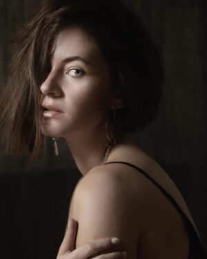 Sandra Mae Frank Instagram - Be fearless in the pursuit of what sets your soul on fire. ✨

📷 - @kairavelson 

For the longest time, I’ve been in awe of Kai’s work because of the rawness and vulnerability that she captures. When the opportunity came to be photographed by her, I had to grab it! I was going through a lot of changes the last several months, good and bad. So, in my session with Kai, I asked her to capture my vulnerability as I’ve been guarded for a long time. 

Several weeks later, she sent me proofs and I fell in love with every one of them because I finally see “her” coming out. She’s been there the whole time yarning to be free. 

Make time to find yourself again, again and again. 

People in your life will come and go, only you that will always remain, so take every moment to love yourself. 

Find your fire and thrive. ✨

[image description]
A fine art photo of Sandra with chin-length hair hiding the left side of her face, silver dangle earrings with quartz hanging, and a black string top.