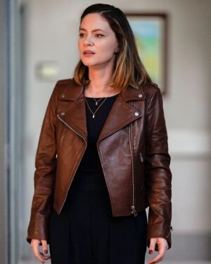 Sandra Mae Frank Instagram - Hold up! 2 hours of #NewAmsterdam tonight starting at 9 EST on #NBC?

So much happening with exciting guests appearance tonight 💙😉

#DamFam

[image description]
Sandra Mae, as Wilder in her maroon faux leather jacket and black jeans, stands in the doorway looking disappointed or concerned.