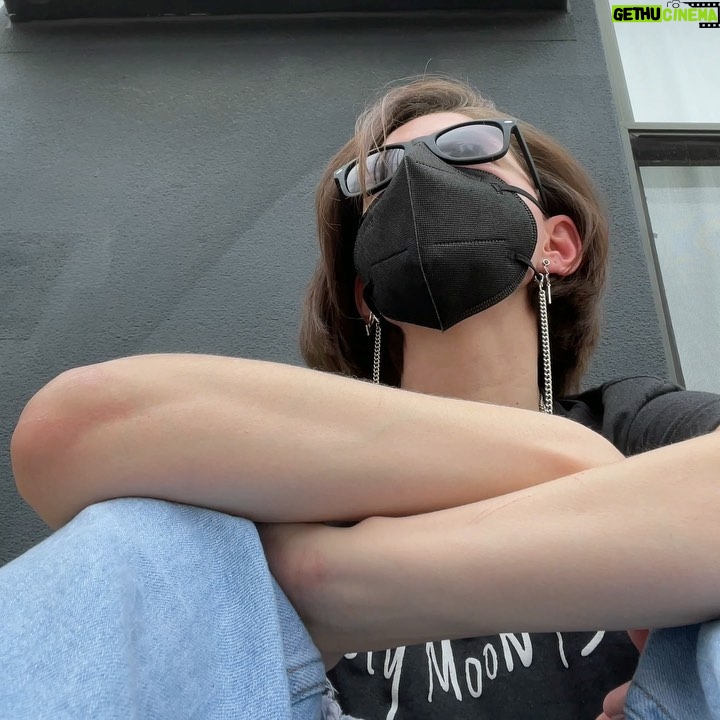 Sandra Mae Frank - 1.5K Likes - I will keep saying it over and over… if you can, please get #vaccinated and keep wearing your #mask.
I know it’s exhausting. I know it has been a year and a half but we’re not out of the woods yet, not even close. We are STILL dealing with the #pandemic as cases are starting to rise again. Yes, some people cannot get vaccinated due to #medical reasons, which I understand, and hope there will be a solution soon. But some people are refusing to get vaccinated “just because” and that drives me crazy.
As long as this continues, we will have to keep wearing our masks, not only to protect ourselves but to protect others around us that may get worse than us. Be considerate. Trust the #science and get vaccinated. And no, looking up a few articles and videos does not make you the expert. Our medical #doctors have been doing the #work tirelessly and want this to end as much as we do.
I do not enjoy wearing masks, especially when I rely on facial expressions for communication access. I do not enjoy not being able to greet strangers as I walk past them. I do not enjoy having to worry every day and all…
But I will continue wearing my mask for however long it takes. The more of us that are vaccinated, the better chances we can get through this.
But until then, please get vaccinated if you’re able and KEEP wearing your mask. 🤟🏻😷
Sandra Mae, a white woman with short brown hair, wearing black sunglasses and a black mask with a chain, sitting in front of the blue wall, wearing light blue jeans with a black t-shirt that says “My moon is in ______” (which is from @cosmicsobbing).
“if you can, please get vaccinated and keep wearing your mask.”
