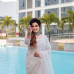 Sangeetha V Instagram - Wonderful grand rich elegant white Saree with long blouse from @frontiers_fashion_lounge and once again sparkling jewelry set from @fineshinejewels and curly designed hair groom by @jenifer_hair_stylist_official