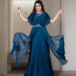 Saniya Babu Instagram - Elegant designer gown in midnight blue shade. . For more product related enquiries and details Phone: 91 9072300004 WhatsApp: 91 8943344181 . . . #mahalekshmisilks #thegenuinesilkpeople #fashionphotography #design #gown #gowndress #gownstyle #gownfashion #trendingfashion #instafahion #reelsinstagram #instagood