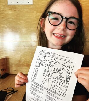 Sara Rue Instagram - KVELLING MOM ALERT!!! 🎉😻Talulah submitted art for the cover of the new kids menu @hugosrestaurants and... was 1 of the 3 WINNERS!!!! Along w the honor of having her art grace the cover of the kids menu (go and ask for the Talulah menu 🤩 and color it in!) she also won a $50 dollar gift card ... so she's a paid artist!!! You guys, I can't wait for her to buy me a vacation home! #proudmom #thispostistalulahapproved #cateatingapancake