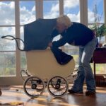 Sarah Beeny Instagram - Much to Graham’s relief, I’ve finally finished restoring my father’s old pram - such simple engineering with basically 4 leather straps providing fantastic suspension. Ok, it doesn’t fold up and fit in the boot, but you can’t have everything!! Xxx . . #renovation #restoration #restorationproject #family #familyheirloom #familyhistory #antiquerestoration #antique #perambulator #stroller #pram