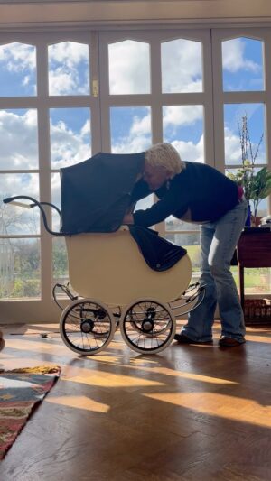 Sarah Beeny Instagram - Much to Graham’s relief, I’ve finally finished restoring my father’s old pram - such simple engineering with basically 4 leather straps providing fantastic suspension.  Ok, it doesn’t fold up and fit in the boot, but you can’t have everything!! Xxx
.
.
#renovation #restoration #restorationproject #family #familyheirloom #familyhistory #antiquerestoration #antique #perambulator #stroller #pram