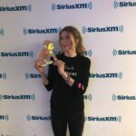 Sarah Chalke Instagram - For my niece’s school project, she had to mail George to me and we had to go on some adventures together. He loved skiing, we got an ear pierce, (his first, my second) went to Radio City Music Hall, he came to work with me, loved New York pretzels…you can visit anytime George.