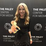 Sarah Chalke Instagram - For my niece’s school project, she had to mail George to me and we had to go on some adventures together. He loved skiing, we got an ear pierce, (his first, my second) went to Radio City Music Hall, he came to work with me, loved New York pretzels…you can visit anytime George.