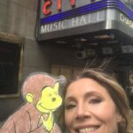 Sarah Chalke Instagram - For my niece’s school project, she had to mail George to me and we had to go on some adventures together. He loved skiing, we got an ear pierce, (his first, my second) went to Radio City Music Hall, he came to work with me, loved New York pretzels…you can visit anytime George.