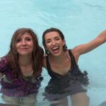 Sarah Chalke Instagram - STUNT performers are amazing. I always realize I’m still not breathing about a minute after the stunt is done. Here are some pics of the scene where I push @indiadebeaufort in the pool, video of the stunt performers falling in, India and i warming up in between in an inflatable hot tub, tea in the pool…❤️ @netflix #fireflylane incredible brave amazing stunt performers @andrea.m.ross @tamaradaroshin