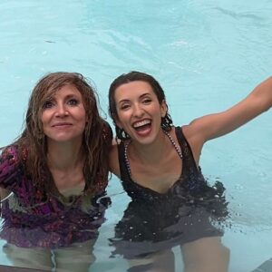 Sarah Chalke Instagram - STUNT performers are amazing. I always realize I’m still not breathing about a minute after the stunt is done. Here are some pics of the scene where I push @indiadebeaufort in the pool, video of the stunt performers falling in, India and i warming up in between in an inflatable hot tub, tea in the pool…❤️ @netflix #fireflylane incredible brave amazing stunt performers @andrea.m.ross @tamaradaroshin