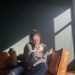 Sarah Desjardins Instagram - Kim is sitting in my lap as I write this. I wouldn’t be able to do it otherwise. 23 years is almost unheard of for a cat. She stuck by my side as long as she possibly could. She knew I needed her more than I did. Today I had to let the love of my life go. I will never forget every second I spent with her. Kim may have been a cat but she behaved like a human being. She understood all my emotions and gave me so much unconditional love and empathy. She spooned with me in the mornings, she curled up on my chest when she could sense that I was sad, she just wanted to be touching me at all times to be honest with you…even if she sat next to me and just placed her paw on my hand. Since I was a kid we were always in it together. She’s moved with me through every city and season of my life. I’m so deeply grateful to have gotten to share it with a little lady this special. My life has always contained a lot of heaviness and Kim has willingly carried that load with me. As of late it’s felt as though my nervous system is finally nearing a point where it’s ready to release some of that weight…no doubt in part to her. A new chapter lies ahead and in the most devastating way it almost makes sense that she wasn’t meant to come with me. (I’m crying now and Kim has migrated to rubbing against my face) While it will be impossible not to feel her absence I will also always carry the profound impact she had on my entire being, the way I love and how I walk through life. Goodbye Kim ♥️ You will be with me forever. watch the last slide till the end. I just found it and it kills me 🤍