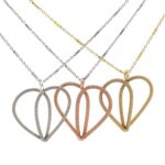 Sarah McLachlan Instagram - These beautiful Heart Necklaces are designed by @heartstringsjewelry.ca using my previously played guitar strings. Proceeds will be donated to @sarahschoolofmusic which provides music instruction at no cost to children and youth facing barriers to access. XoS