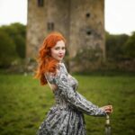 Sasha Alsberg Instagram - 👑 She never cared for a crown. She preferred a sword. 🗡️ this dress makes me feel like I stepped off the pages of a book. I wonder what the title would be…. Dress: @aclotheshorse’s from @chotronette (SO BEYOND STUNNING!) Photo by: @friendofthekingfisher #ireland #ladyknight #romanticacademia #womenwithswords #darkacademia #booktok #tog #fantasybooks #fairycore #faerie #visitnorthernireland