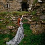 Sasha Alsberg Instagram - 👑 She never cared for a crown. She preferred a sword. 🗡️ this dress makes me feel like I stepped off the pages of a book. I wonder what the title would be…. Dress: @aclotheshorse’s from @chotronette (SO BEYOND STUNNING!) Photo by: @friendofthekingfisher #ireland #ladyknight #romanticacademia #womenwithswords #darkacademia #booktok #tog #fantasybooks #fairycore #faerie #visitnorthernireland
