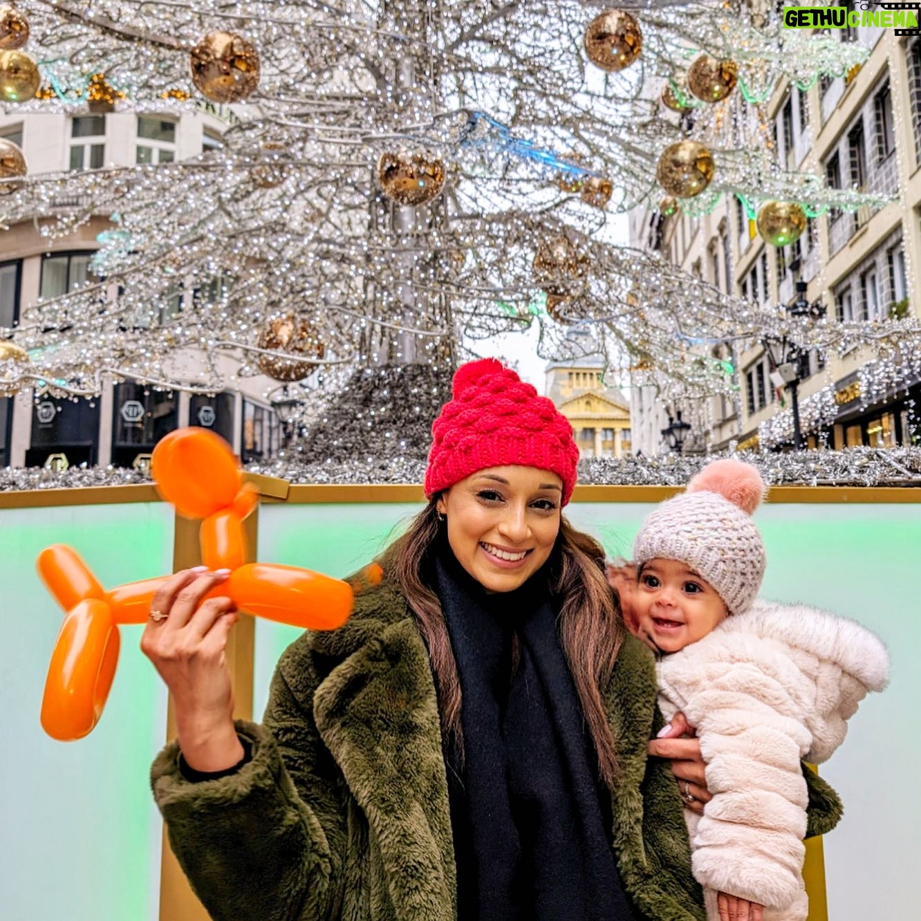 Seema Jaswal Instagram - Thanks @googleuk #Pixel8Pro 🩵 If you’ve ever taken a photo with a little one, you will totally relate to this. A few weeks ago we went to Budapest on a family holiday and took our 8 month daughter to visit the Christmas Markets. We had the most magical time and experienced lots of firsts….including Ava seeing her first ever Christmas Tree. We took a few photos in front of the tree (and in front of a queue of people also waiting to take theirs) on the iconic Fashion Street in the centre of Budapest … no pressure! With the distraction of balloons and baubles, we finally got a smile and guess who closed their eyes 🙋🏽♀️🤦🏽♀️ Thank you ‘Best Take*’ … you saved me from having to re-queue over and over again to get the best pic! #AD *Requires Google Photos app. May not work on all images. Takes 5-7 consecutive photos within 10 seconds. Works on photos with 2 to 5 people. Will not work in low light or with pets. #googleuk