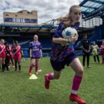 Seema Jaswal Instagram - AD Thrilled to have joined @suresportuk on site at @chelseafc last week to see its #BreakingLimitsProgramme in action. The programme works with NGOs and grassroots initiatives around the world helping disadvantaged young people to break down the barriers holding them back from moving however they want. Sure recognises the power of movement and how important it is that everyone has the ability to move however and whenever they want. It’s part of the reason why I’ve been an ongoing Sure partner, as a sports fan, supporter and now parent, I want to make sure my little girl has every opportunity to partake in movement and sport however she chooses. Sport can teach us so much more than we realise and that transcends to so many other parts of our lives. It’s such a powerful tool for social change and it was an honour see programmes like this one in action. And bonus, I got to catch up with my friend @enialuko and I got some tips from the coaches from @chelseafc for my Sure #BringTheHeat challenge!