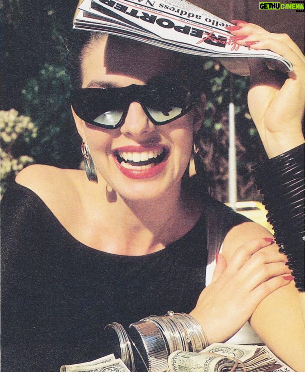 Sela Ward - 3.2K Likes - How’s your 2021 looking so far? Thinking back on this not so distant past photoshoot, fake prop money and brighter days.