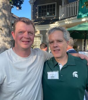 Sharon Lawrence Instagram - Saturday it was a #GDTBAS (GoodDayToBeASpartan - IYKYK) ! As hard as it was to let Chancellor @kevinguskiewicz leave @uncchapelhill , having him become President of @michiganstateu made it easier ! 
Thank you to the West Coast #msuspartans supporters, particularly host Crowley Sullivan, (hey @kithoover he’s a great host, but we missed you my fellow #spartheel )  for a great afternoon with the athletic leaders like AD, Alan Haller. 
Tom was in heaven meeting the #bigtenhockey champions 💪👏💪 coach #AdamNightengale and the new @msu_football new coach Jonathan Smith .  I loved our reunion with @drrajones6 and @clinton.jones.3158 and hearing Kevin’s excitement about leading the a #msuspartans . See you all this fall in East Lansing!