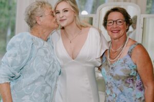 Shelby Wulfert Instagram - and this big, beautiful family I am so blessed to be part of 🥰 

The love that my mother & father in law have for each other has grown into the big love we all share. I’m so happy to have sisters like I’ve wished for since I was a little girl & treasure my moments with each of them and their wild bunches 💛

Becoming an auntie to these kids has been one of my greatest joys in life so far. And having lost my own grandparents, it’s been incredibly special to get to be a granddaughter again. When we first called Mammaw to let her know we were engaged, she said in her sweet as Texas tea accent, “well it’s about time Lucas! Shelby, I’ve always thought of you as my granddaughter but I’m glad we’re making it official.” 😭 

It was so special to share this day with all of you. From watching the littles color while I was getting my hair & make up done, to my hook and eye coming off my dress and having my mama & mama in law sew a new one on for me. Oh, and forgot to mention our night was interrupted by a few copperhead snakes which were swiftly remedied by my father in law’s cowboy boots and pocket knife 🐍🫣 #texasyall

Photographer: @natalienicolephoto 
Venue: @chateauhiddenwood 
Hair: @meghanmcnameebeautydtx 
Make Up: @ashleymariedoesmakeup