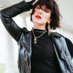 Shenae Grimes-Beech Instagram - A simple but elevated “posh punk” moment with a hint of Mortician Addams thrown in for good measure! This brass and crystal jewelry set is 🤩 and this silk dress and sweater actually come as a set but are beautiful pieces to style independently as well. I love a versatile wardrobe addition! Comment OUTFIT and I’ll DM you all the links or head to My LTK Shop (linked in my bio!)