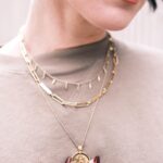 Shenae Grimes-Beech Instagram - If you’re a basics gal, you NEED these ✨ I love playing dress up but 9/10 you’ll find me in a basic tee or crewneck sweater. Quickest way to style a classic staple like that for every day is 3 layered gold necklaces. ✨ I genuinely never take the ones you see here off. I am a low maintenance girly so if I’m going to buy jewelry, I better be able to sweat, shower and sleep in it!! Comment NECKLACE for links to the ones I’m wearing 🖤