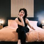 Shenae Grimes-Beech Instagram - DARK ZEN BEDROOM MAKEOVER 🖤✨ After making over our kid’s bedroom in the London flat, I felt like our primary bedroom was in need of a little transformation, too! The grey wall and grandma bedding need a warm, modern update and these wood wall panels and terracotta waffle linens from @pigletinbed were just what the room needed to feel like the cozy oasis I wanted! What we used: Bedding: @pigletinbed Toffee Waffle duvet cover, pillowcases and fitted sheet. Will link this set in my stories. Sooo comfy and washes and wears beautifully!!) Paint: @valsparpaint Magpie Wall panels: @thewoodveneerhub Nightstands, lamps & rug: @dunelmuk #bedroomdesign #homemakeover #darkaesthetic #hometransformation #londonliving