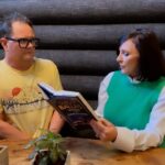 Shirley Ballas Instagram - When Murder on The Dance Floor is a little too hot for @chattyman to handle 😂 … have you got up to this chapter yet ? I had a fabulous time the Life’s A Beach podcast and the episode is now out. Please take a listen on any podcast platform, just search Alan Carr Life’s A Beach. We chat all about dance, travel, food and holidays. Enjoy. Xx Shirt @mchughlifestyle #alancarr #lifesabeach #podcast #book #murderonthedancefloor