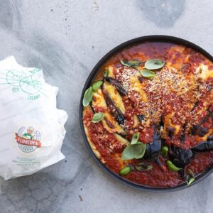 Silvia Colloca Instagram - Think eggplant parmigiana, but a lot easier and phenomenal in flavour! 
Hassleback Eggplant Parmigiana

From my new show @silviasitalianmasterclass 
Ingredients

2 large aubergines
600 ml of passata
200g @floridiacheese casalingo -or your melty cheese of choice) sliced into 1 pieces
½ cup fresh breadcrumbs
¼ cup (60ml) of extra-virgin olive oil
salt and pepper for seasoning
fresh basil, leaves picked to serve

Method

Preheat the oven to 180°C, fan 160°C. Cut lengthways slits into the aubergines about 1cm apart, leaving the stalk attached and taking care not to cut right down to the bottom  OR Pre heat your @oonihq pizza oven to 250C 
Cut lengthways slits into the eggplants about 1cm apart, leaving the stalk attached and taking care not to cut right down to the bottom
Arrange the fanned eggplant into a large roasting tin or ovenproof dish and season. Drizzle with half of the oil and bake for 20 minutes in a traditional oven, and 15 minutes in a pizza oven. 
Take the tray out of the oven, place mozzarella in between eggplant slices, cover with passata, season to your liking, top with breadcrumbs and drizzle with remaining olive oil. Bake for 15-20 minutes or until melty and golden brown. This will only take 5-6 in a pizza oven. 
Serve with bread and basil leaves.
Watch on @channel10au  or @10playau