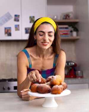 Silvia Colloca Instagram - These 5 minutes donuts are so easy to make it’s criminal! Their ineffable lightness is a combination of @floridiacheese ricotta and @sanpellegrino_aus limonata!
Remember you can catch my new show @silviasitalianmasterclass on @channel10au on Saturday at 12.30 or anytime on @10playau 
🇮🇹❤️

Ricotta and Lemonade Zeppole
Ingredients

2 eggs, lightly beaten 
2 tbsp. caster sugar 
1-1/4 cup of ricotta,  well drained 
120g of sifted self raising flour 
Finely grated zest of 1 lemon 
75 ml of sparkling limonata
vegetable oil for deep frying
Icing sugar for dusting on top
Method

Combine ricotta, eggs, sugar, zest in a medium bowl. 
Add the flour and limonata and mix gently. This batter is very 
forgiving and a few lumps are an addition to the texture. 
Pour oil into a shallow saucepan, and heat over medium-high heat. 
Drop tablespoon of batter into the hot oil and fry, in batches, for 2-3 minutes or until golden.
Drain on paper towels and serve hot, dusted with icing sugar.