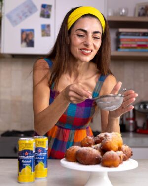 Silvia Colloca Instagram - These 5 minutes donuts are so easy to make it’s criminal! Their ineffable lightness is a combination of @floridiacheese ricotta and @sanpellegrino_aus limonata!
Remember you can catch my new show @silviasitalianmasterclass on @channel10au on Saturday at 12.30 or anytime on @10playau 
🇮🇹❤️

Ricotta and Lemonade Zeppole
Ingredients

2 eggs, lightly beaten 
2 tbsp. caster sugar 
1-1/4 cup of ricotta,  well drained 
120g of sifted self raising flour 
Finely grated zest of 1 lemon 
75 ml of sparkling limonata
vegetable oil for deep frying
Icing sugar for dusting on top
Method

Combine ricotta, eggs, sugar, zest in a medium bowl. 
Add the flour and limonata and mix gently. This batter is very 
forgiving and a few lumps are an addition to the texture. 
Pour oil into a shallow saucepan, and heat over medium-high heat. 
Drop tablespoon of batter into the hot oil and fry, in batches, for 2-3 minutes or until golden.
Drain on paper towels and serve hot, dusted with icing sugar.