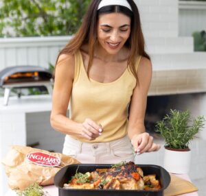 Silvia Colloca Instagram - Sensational one-tray chicken dinner! 

Made with succulent @inghamsaustralia chicken, seasoned with Colavita oil and balsamic by @basile_imports and baked outdoors with @ooni.anz 

Hardly any labour and tonnes of flavour! And we get to use up bits of stale bread we all have in our kitchen!

Chicken Tray Bake

Ingredients

 1 whole chicken butterfiled 
3/4 cup of  cherry tomatoes , halved 
1/2 cup of black olives, pitted
1 tablespoon capers, drained and rinsed 
1 garlic bulb, halved
½ cup (125 ml)  dry white wine
100 ml of extra-virgin olive oil
thyme leaves
5 slices of stale sourdough cut into chunks
salt for seasoning
balsamic vinegar for drizzling on top

Method

Pre-heat your oven to 180 C conventional or 160 fan forced. 
Oil an oven safe dish, add the cherry tomatoes and their juices, olives, capers, garlic, wine and half  of the oil. Add thyme leaves, bread chunks and season with salt. Place chicken on top, season with salt and pepper and drizzle some of the liquid onto it. 
Bake for 35-40 minutes or until the chicken is cooked through and crispy golden on top, the cooking time will be dependent on the size of your chicken, so keep an eye on it. Take the tray out of the oven, scatter more thyme leaves on top, drizzle a little extra-virgin olive oil and a little balsamic vinegar and serve.

From my show @silviasitalianmasterclass on @channel10au and @10playau