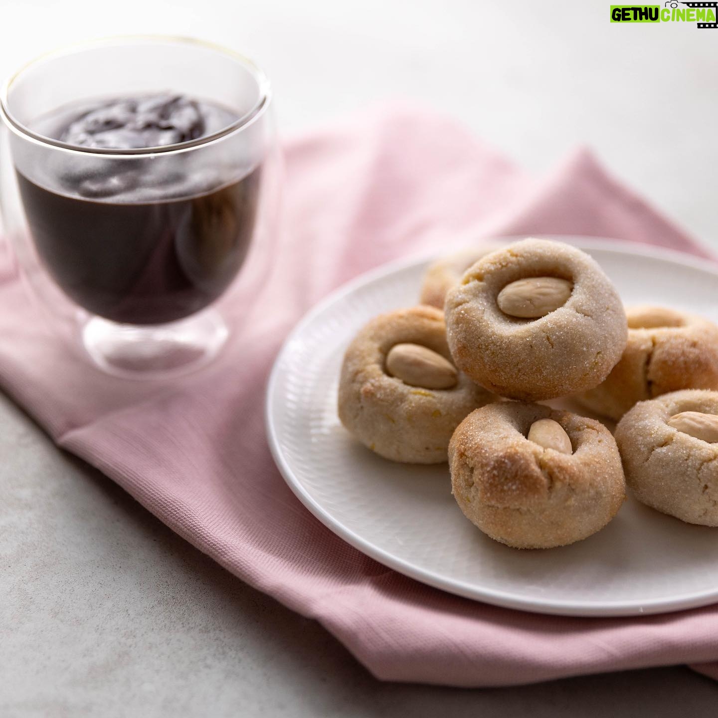 Silvia Colloca - 1.1K Likes - A little sweet moment, with all the Italian flaire. We do hot chocolate thick and dense…. Highly addictive… add a touch of @illyinaustralia for an extra boost!
@silviasitalianmasterclass
Italian Style Espresso Hot Chocolate with Almond Cookies
Ingredients
For the hot chocolate
Serves 2
2 tbs Dutch cocoa powder
80 g (1/3 cup) caster sugar
2 scant tablespoons cornflour
1/2 teaspoon vanilla bean paste
500 ml (2 cups) milk
2 shots of freshly brewed espresso coffee
2 tablespoons dark chocolate chips
Method
Combine the cocoa, caster sugar, cornflour, vanilla in a small saucepan.
Pour in 3 tablespoons of the milk and whisk until the mixture turns into a sticky, dark brown paste. Slowly add the rest of the milk, whisking enthusiastically as you go to prevent any lumps from forming. Add the espresso shots and stir through.
Place the saucepan over medium heat and bring to a simmer, stirring constantly with a wooden spoon or spatula. Reduce the heat to low, add the chocolate chips and cook, stirring, for 2–3 minutes or until the hot chocolate starts to thicken. Turn off the heat, serve hot.
For the almond cookies
makes 18
2 egg whites, at room temperature
170 g caster sugar, plus extra for rolling the cookies in
300 g almond meal
2 teaspoons vanilla extract or paste
finely grated zest of 1 lemon
18 blanched almonds
Method
Preheat your oven to 160°C fan forced, 180 C conventional
Place almond meal in a large bowl, add vanilla, lemon zest and egg whites and mix with your hands to form a paste.
Shape the paste into balls, roll them in the sugar, then gently push your thumb into the middle of each ball and top with a blanched almond
Place the cookies in a baking tray lined with baking paper and bake for 18-20 minutes or until the base of the amaretti looks firm and slightly golden.
Cool them on a rack for at least 10 minutes before eating