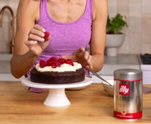 Silvia Colloca Instagram - The most delicious, decadent and satisfying chocolate cake! None of the gluten and all of flavour! With hints of hazelnut and the boost of @illyinaustralia to make the chocolate more chocolat-ty!
@silviasitalianmasterclass @10playau @channel10au 

 150 gr of unsalted butter
160 gr of 70 % dark chocolate
45 gr of dutch cocoa powder
50 ml espresso coffee
1 teaspoon of vanilla extract
200 gr of firmly packed brown sugar
4 eggs
120 gr of hazelnut meal
Pinch of salt
Serve with mascarpone and berries

1. Heat your oven to 160 C
2. Melt the butter with the chocolate in a double boiler
3. Pour the hot coffee into a bowl with the cocoa powder and whisk until there are no lumps. Add the
vanilla and mix. Add the cocoa mixture to the buttery melted chocolate and stir to combine.
4. In a separate bowl, cream the yolks with the sugar with a whisk or an electric beater until fluffy then pour
in the chocolate mixture. Add the hazelnut meal and stir to combine.
5. In a clean, dry bowl, beat the egg whites with a pinch of salt until soft peaks form. This will take about 1
minute if using a hand-held electric beater. A fair bit more if doing by hand...Gently fold the egg whites through the chocolate mixture using a large metal spoon. Pour the batter into a 20 cm round cake tin, lined with baking paper. Bake for 40/45 minutes or until the edges are firm and the surface it slightly cracked and feels soft in the middle.
6. Once cool it can be topped with strawberries, berries cherries, and mascarpone, cream or both!

Serving plate by @maxwellandwilliamsofficial