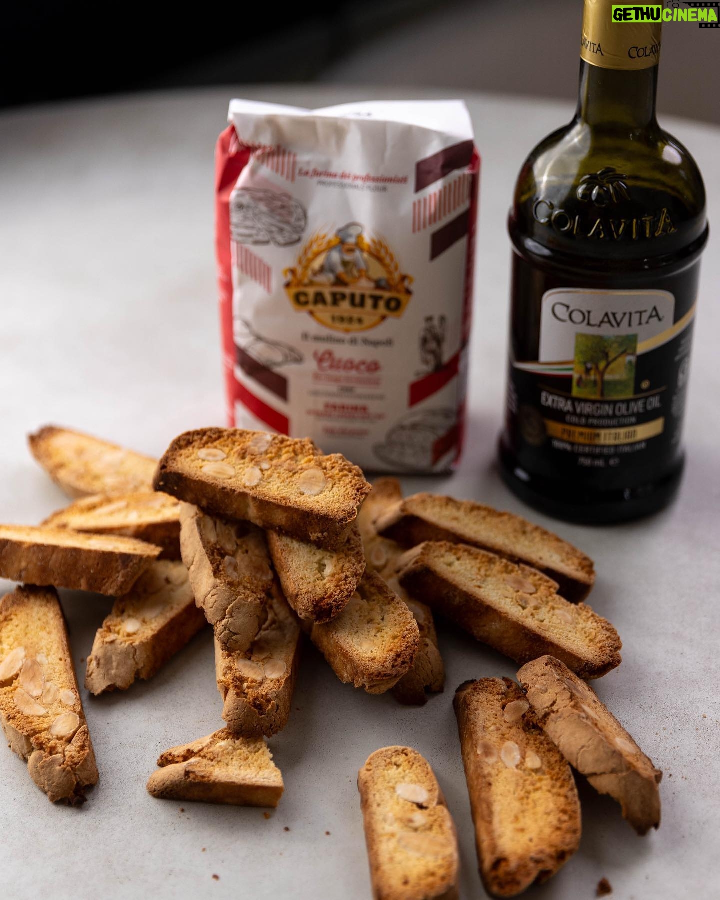 Silvia Colloca - 0.9K Likes - The most loved Italian biscuits: biscotti!
Crunchy, nutty, sweet… perfect for dunking!
Made with beautiful @mulinocaputo flour and Colavita olive oil, distributed in Australia by the amazing Basile family, long time collaborator of mine @basile_imports
Lemon and Almond Twice Baked Tuscan Biscotti
Ingredients
2 eggs
3 egg yolks
350 g caster sugar
1 teaspoon vanilla paste or extract
450 g self-raising flour, sifted (or plain flour mixed with 1 tablespoon of baking powder)
1 tbs baking powder
1 tbs extra virgin olive oil
pinch of salt flakes
finely grated zest of 2 lemons
200 g blanched almonds
Preheat your oven to 190°C (170°C fan-forced) and line a large baking tray with baking paper.
Place the eggs, egg yolks, sugar and vanilla in a mixing bowl and beat until pale and creamy. Add the flour,baking powder oil, salt and lemon zest and then the nuts. Shape the dough with floured hands to form two logs. Place the logs on the prepared tray, spaced well apart to allow for spreading, and bake for 25–30 minutes or until well risen and pale golden.
Remove from the oven and cool at room temperature for 3–5 minutes, then cut them on an angle into 1–1.5 cm thick slices. Make sure you use a very sharp serrated knife to ensure neat slices. You will notice than the inside of the biscuits are still a little wet – this is fine.
Arrange the slices on the lined tray and return to the oven for 5 minutes. Turn them over and toast for a further 15 minutes or until crisp and golden. Cool at room temperature, then serve with gelato, coffee or your favourite dessert wine. Any leftover tozzetti will keep in an airtight container for up to 2 weeks.
Watch @silviasitalianmasterclass on @channel10au and @10playau