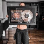 Skylar Grey Instagram - Gold baby #lastonestanding #venom #polog #riaa #goldrecord