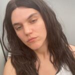 SoKo Instagram – A disheveled lesbian in a porta potty with a wig on.
🎥