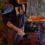 Sohla El-Waylly Instagram - Learn about the evolution of the al pastor taco in the latest episode of DEEP DISH, our limited run podcast miniseries in collaboration with the @thesporkful ! There are lies. There is betrayal. There’s pineapple. If you can’t find a trompo near you, try this recipe (adapted from @alexstupak ) for pork tacos with a hint of pastor: for adobo: 8 ancho chiles 8 guajillo chiles 1 chipotle morita chile 1 2-inch stick of Mexican cinnamon 1 tbsp achiote seeds or 1 cube achiote paste 1 tsp black peppercorns 1 tsp Mexican oregano 1/4 tsp cumin seeds 3 cloves 20 garlic cloves, skin on 1 cup apple cider vinegar for tacos: oil for the grill 1 cup adobo Four 1⁄2-inch-thick boneless pork shoulder steaks Kosher salt 12 corn or flour tortillas, warm 1⁄4 ripe pineapple, peeled, cored, and cut into 24 even slices 1⁄2 medium white onion, minced 1 bunch cilantro, roughly chopped 2 limes, cut into wedges Salsa for serving Make the adobo: Remove the stems from the chiles and tear open. Shake out and discard the seeds. Tear into small pieces.…..
