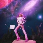 Sophie Luborsky Instagram - Obsessed drops Friday so here’s some bts pics 1st pic @poppy_shaw Every other pic @bychristophermichael - - Produced and creative directed by: @sophiep0wers Assistant Producer & 2nd AD: @tayloredgin Photos by : @bish.op 3D art: @saigeixe Videographer: @tommysavagekelly Bts and videography : @averagecowgirl Set Designers: @jadeddirections & @andiearbo Prop Fabrication: @Andiearbo Helmet fabrication: @suedeclacy  Art Department: @denisfagundes & @emlavengood Bts photographer: @bychristophermichael G&E BTS photos: @sashapaskal.cine G&E Team: @rake_ @poppy_shaw Hair: @Annabelle.cushman Wig: @shmeggsandbaconn MUA: alisonchristian.mua Costume Design: @clockworkbex Outfit design : @sophiep0wers @clockworkbex Location: @sci_fi_studios_ Amazing team: @atlanticrecords @tagmusic @mddnco