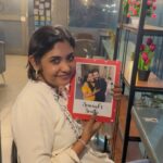 Sruthi Shanmuga Priya Instagram - @sugarygifts Such a lovely and memorable gift to cherish. A photo book which I can carry handy wherever I go. It looks so beautiful with a bunch of our favourite beautiful memories from Paris and Spain. The little gifts that remind every beautiful memory in my day to day life. The keychain, the stand, the photo book and everything, I find it so special. Thank you so much @sugarygifts for such creative cute gifts. You’re playing a big role in connecting with his memories ❤️ thanks a lot ~ARAVIND’s SRUTHI forever ♾️ #sugarygifts #photobook #cutegifts #memories #happiness