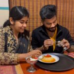 Sruthi Shanmuga Priya Instagram - Epavumae, Naa Athellam vangi unaku tharuvaen kanmani ❤️💕 My lovely food partner and crime partner @arvind__shekar Any dessert lovers like us ? Arvind’s favo is kaju Kathi and Kunafa. Mine for jamoon with vanilla ice cream forever ❤️✨ Comment your favourite dessert and go grab it if you crave for gulab jamoon after this video 😀❤️