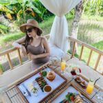 Stella Lee Instagram – Taking out my camera to capture the beauty of this resort @kamandalu 

1. Resort from the top
2. Floating breakfast
3. My Balinese style bedroom
4 & 5. Picnic Paddy Lunch
6. Spa in the forest
7. Romantic candle light dinner in the garden
8. Breakfast time
9. Boat at the fish pond
10. My one bedroom pool villa from the top

Which picture is your favorite? Yes I took the drone pic by myself 😜