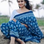 Subiksha Instagram - Which is your favourite ? 1 or 2 #swipeleft 🩵🤍 ‘Combination of Saree & beach is always a magic’ conceptualization : @arunprajeethm MUA : @jeru_bridal_studioo Blouse : @sesha_bridalwear Saree : @nesavaruviboutique Photography : @xposurestudio.in #beach #girl #prettysaree #attractive #women #beachphotography