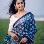 Subiksha Instagram - Which is your favourite ? 1 or 2 #swipeleft 🩵🤍 ‘Combination of Saree & beach is always a magic’ conceptualization : @arunprajeethm MUA : @jeru_bridal_studioo Blouse : @sesha_bridalwear Saree : @nesavaruviboutique Photography : @xposurestudio.in #beach #girl #prettysaree #attractive #women #beachphotography