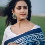 Subiksha Instagram - “Every saree tells a story , can you read mine..?“ 💙🤍 conceptualization : @arunprajeethm MUA : @jeru_bridal_studioo Saree @nesavaruviboutique Blouse @sesha_bridalwear Photography : @xposurestudio.in #saree #sareelove #blue #love #trending #attractive #prettygirl #beach #girl #sareegirl